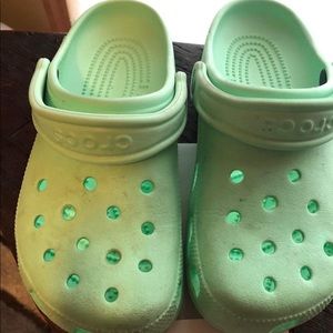 Mint green crocs